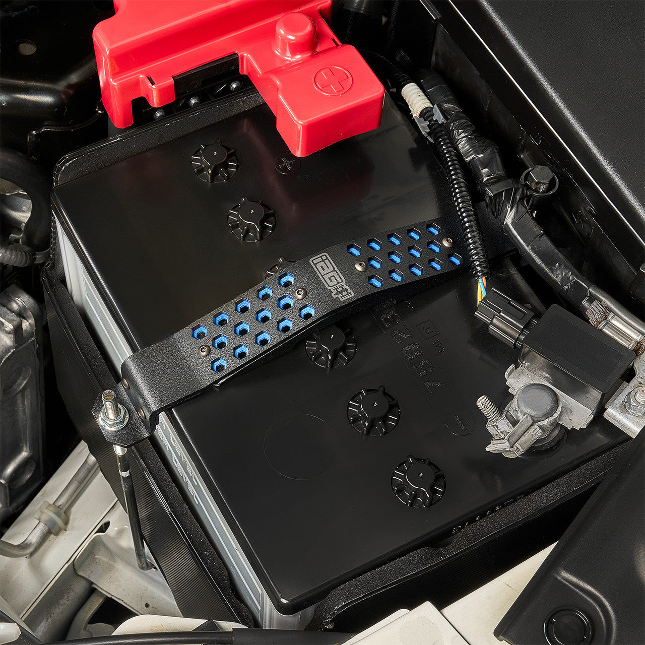 IAG Subaru Battery Tie Down - Blue Installed
