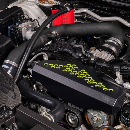 IAG Alternator Cover For 2022-26 WRX - Neon Yellow Installed Close-up
